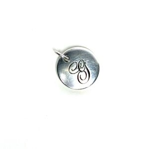 Tiffany Notes
Letter “G” Round Pendant in Sterling Silver